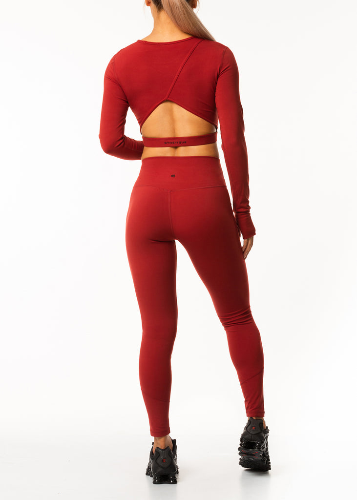 Women's red long sleeve top cut out back 