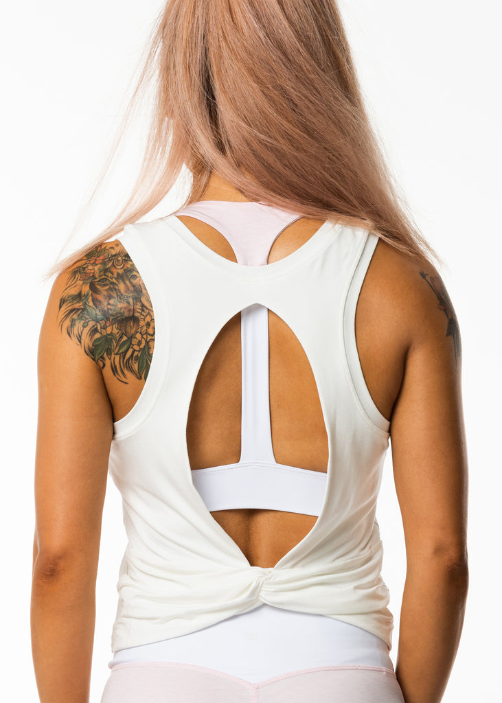 Women's gym clothing online nz, tank top in white, cut out back, twist detail, racer back, relaxed fit