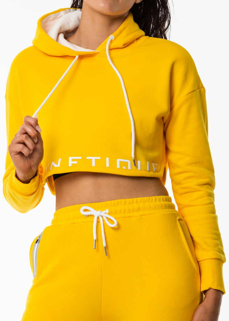 Women's street wear nz, yellow cropped hoodie, white drawstring, long sleeve, lined hood
