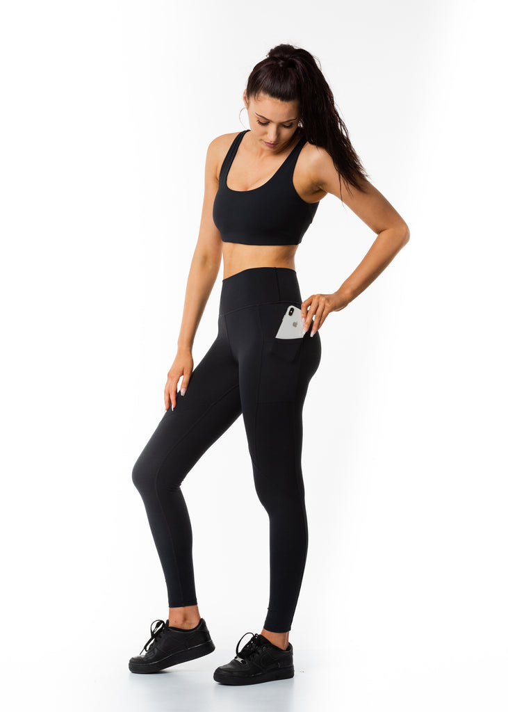 Women's premium activewear online New Zealand, Gynetique black leggings 100% squat proof, side pockets for phone and cards, full length