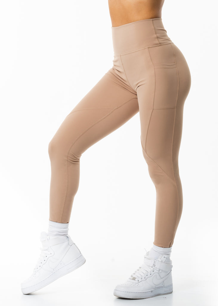 Women's gym clothing online New Zealand, gynetique Intense beige leggings with phone pockets