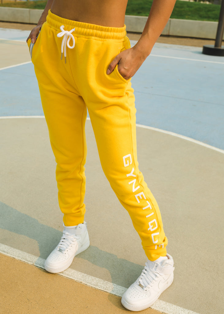 Women's activewear nz, Gynetique Identity jogger sweat pants in sunflower yellow colour