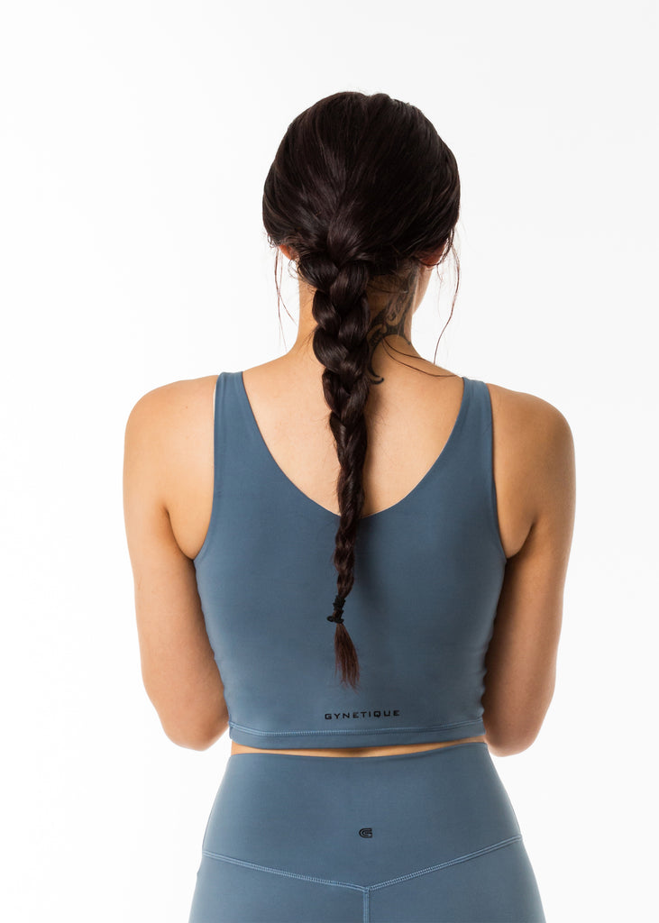 NZ gym wear online, gynetique bare with me sports bra longline top, crop length, colour blue ridge, v neck, black logo on back