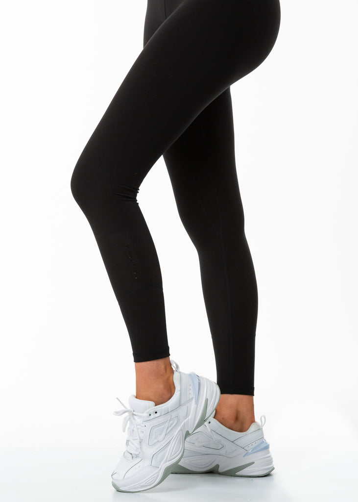New Zealand Women's full length high waist black tights white sneaker