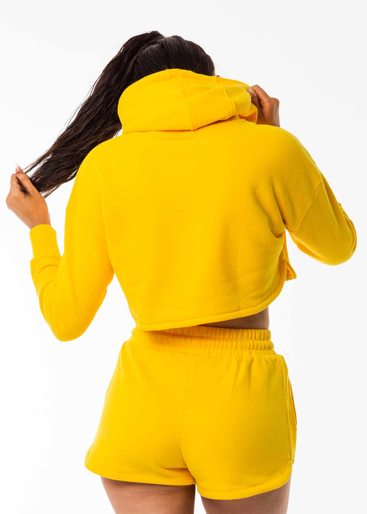 Women's street wear fashion clothes, bright yellow cropped hoodie, lined hood, split side hem, long sleeve